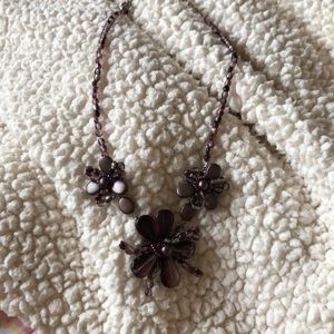 Beautiful brownish purple necklace.